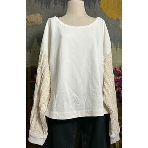 Anthropologie White Top with Cream Cable-Knit Sleeves
